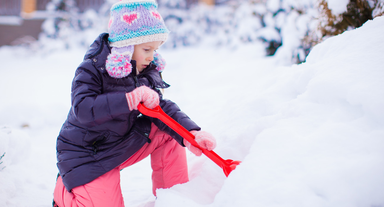 vecteezy little adorable girl play with snow shoveling on winter day 17706529